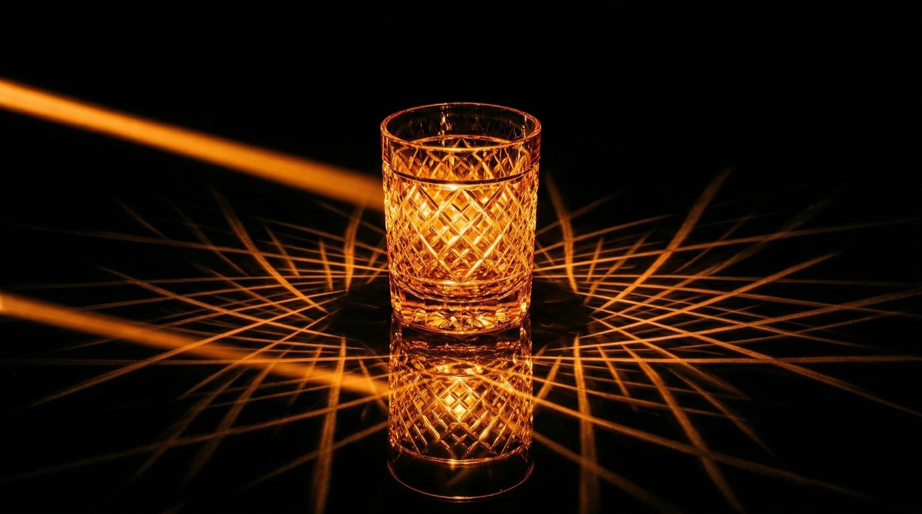 Amber Kiriko glass with caustic light patterns — the luminous quality that defines Tokyo